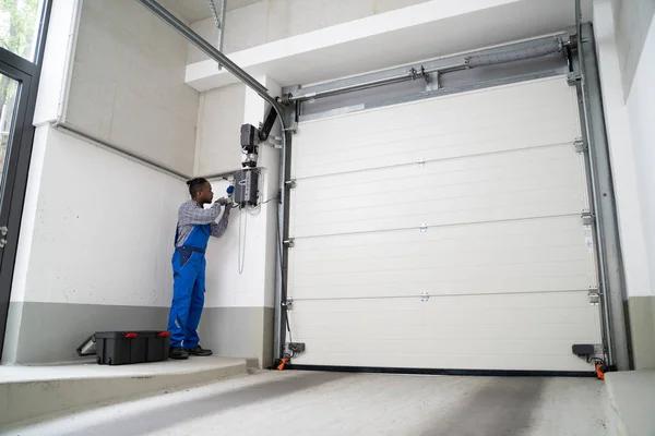 Step by Step Garage Door Spring Repair Solutions
